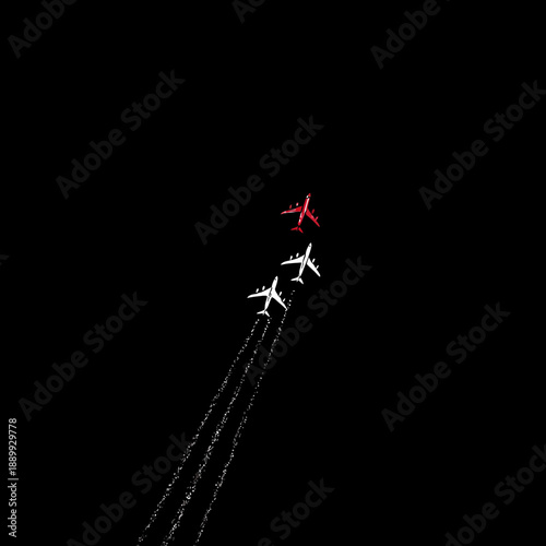 Three airplanes flying against black backdrop aerial view