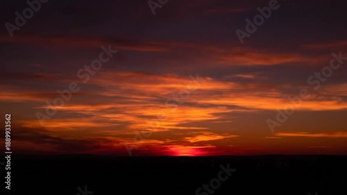 Sunset Landscape with Orange Sky and Clouds.