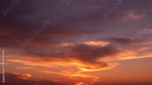 Vibrant Sunset Sky with Orange Clouds.