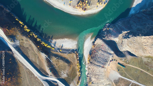Obraz na płótnie Aerial View Meandering River Splitting Around Sandy Islets, Deep Turquoise Chann