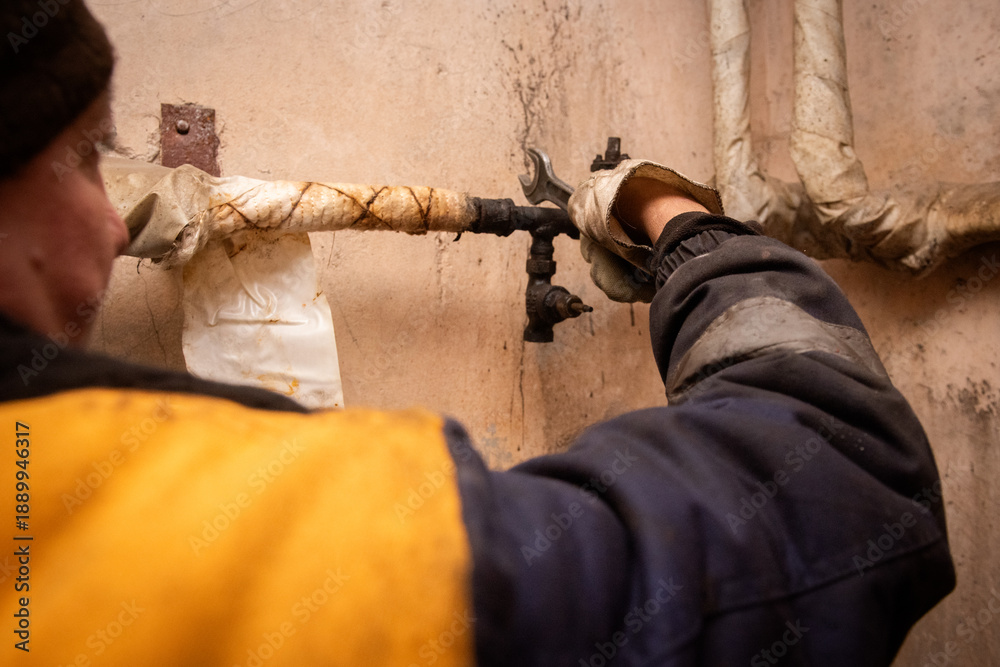 Fototapeta premium Kyiv utility crews are heating clogged heating pipes