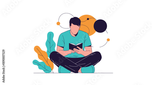Young man sitting cross-legged on the floor while focused on reading a small book with abstract colorful geometric shapes in the background.