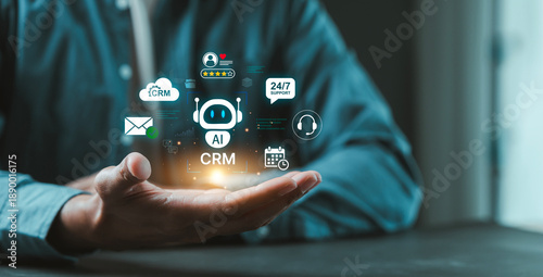 Cuadro en lienzo Businessman hand holding virtual AI robot with CRM customer relationship managem