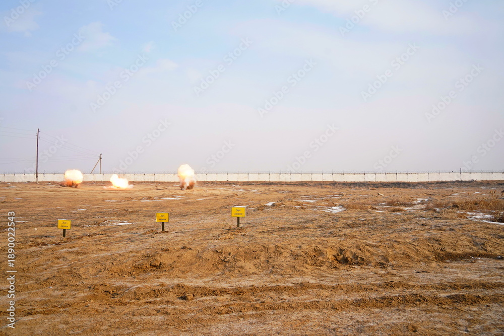 Fototapeta premium Detonation of a mined field. Military exercises.