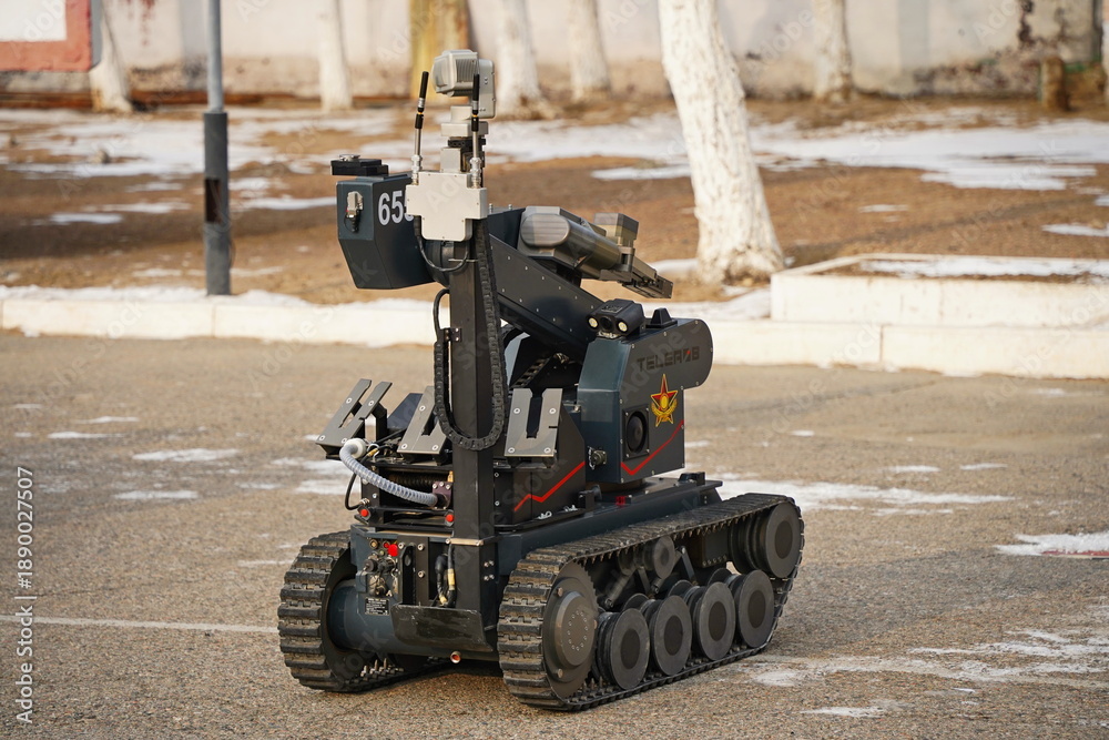 Fototapeta premium Almaty, Kazakhstan - 01.20.2026 : A minesweeper robot for mine clearance. Military exercises.