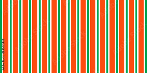Striped candy cane Christmas seamless pattern. Red and green diagonal lines wallpaper. Winter holiday present wrapping paper. Vector gift decor backdrop. Xmas peppermint repeating background.Eps10