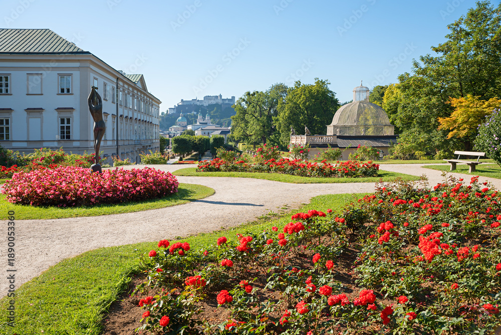 Fototapeta premium pictorial spa garden Salzburg, with view to Fortress, Mirabell castle and Museum.