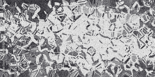Abstract monochrome textured background with organic cellular patterns and grainy noise effect creating a distressed and complex visual surface