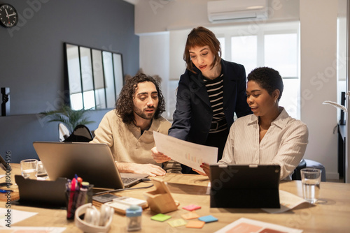 Wallpaper Mural Diverse team collaborating on office project Torontodigital.ca
