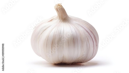 A whole garlic bulb with papery white skin on a white background. Concept Garlic bulb, White background, Food photography, Kitchen staple, Close-up