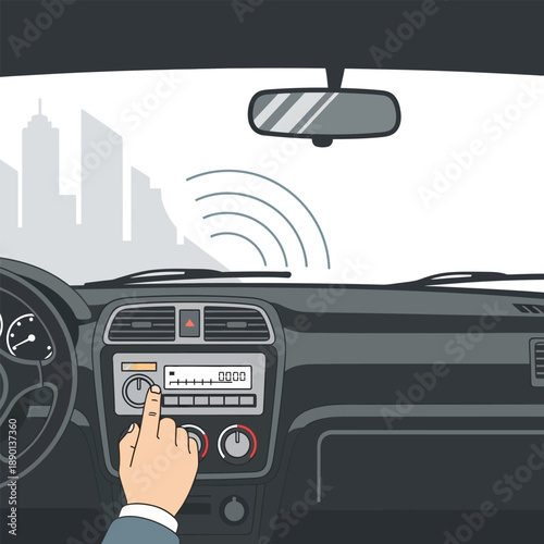 Driver adjusting car radio tuner knob for audio tuning and sound selection