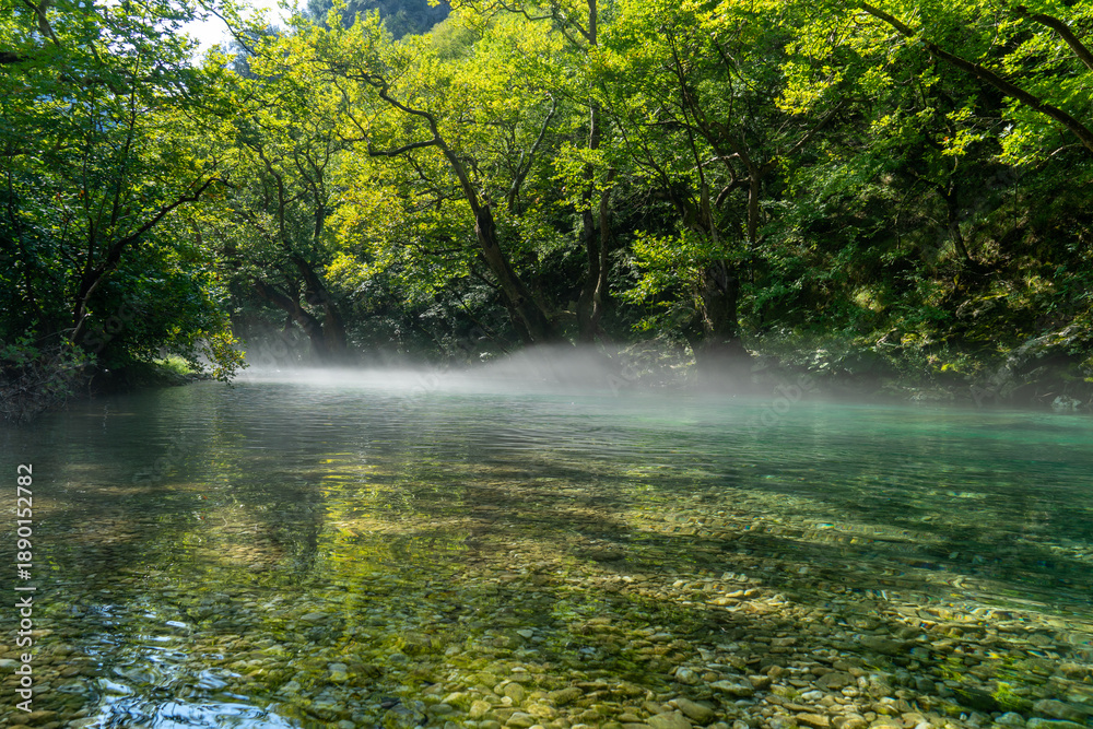 Fototapeta premium Rafting Adventure on the Voidomatis River – Scenic Waterways and Epic Nature in Greece