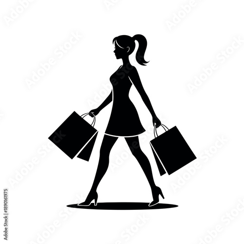Silhouette of a fashionable woman walks confidently while carrying two large shopping bags.