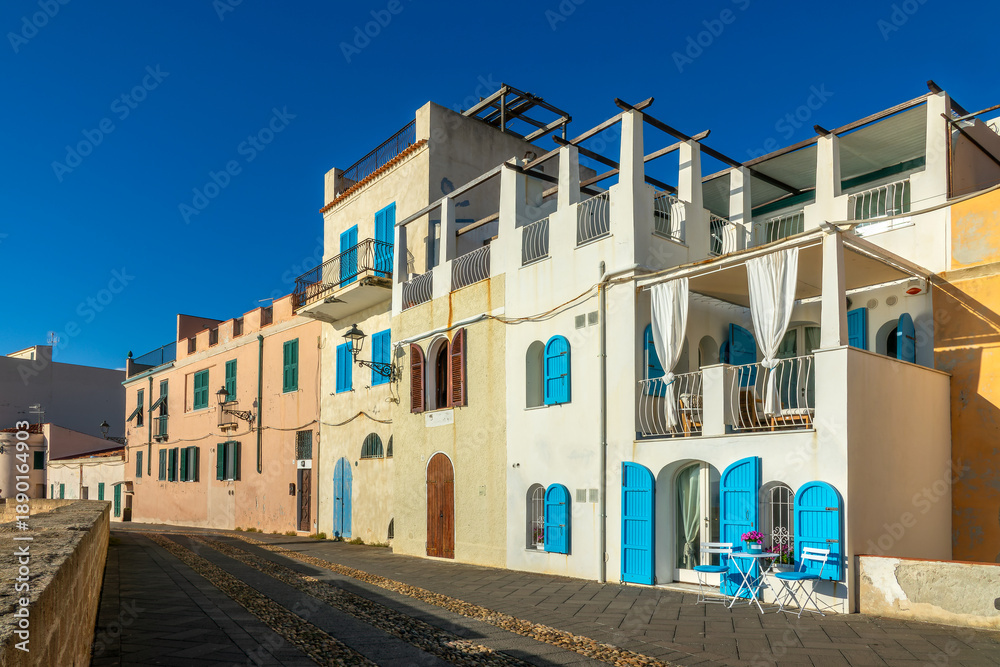 Fototapeta premium View of the old town and the promenade on the ramparts of Alghero, Sardinia island, Italy