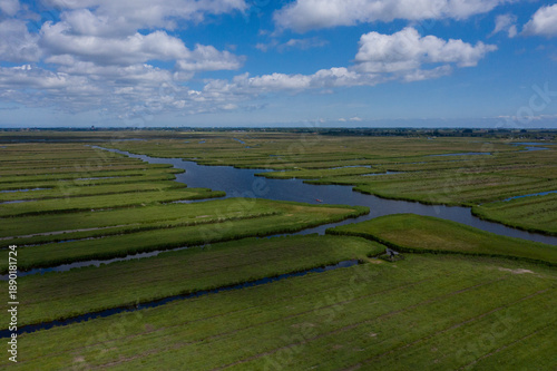 Aerial view of  over Historic dutch Waterland landscape in may, the ilperveld near Den Ilp and Landsmeer the  Netherlands