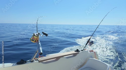 Offshore trolling fishing rods on boat in open sea