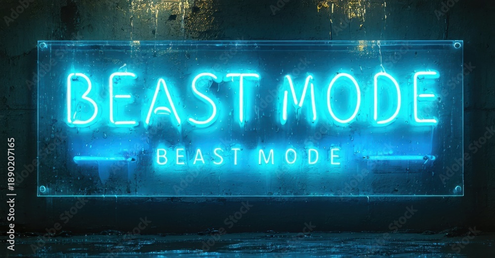Obraz premium Bright neon sign displays Beast Mode. Dark background creates dramatic lighting effect. Modern, bold typography dominates image.