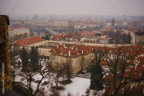 A panorama of Prague in winter. The red tiled roofs of Old Europe