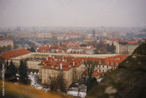 A panorama of Prague in winter. The red tiled roofs of Old Europe
