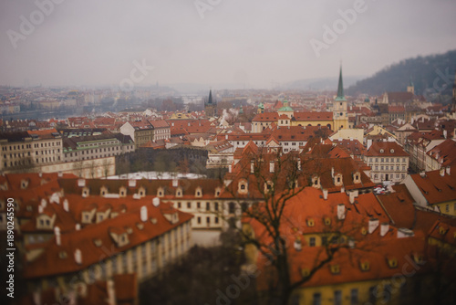 A panorama of Prague in winter. The red tiled roofs of Old Europe