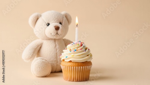 Cute teddy bear with birthday cupcake and candle - perfect for celebrations and invitations