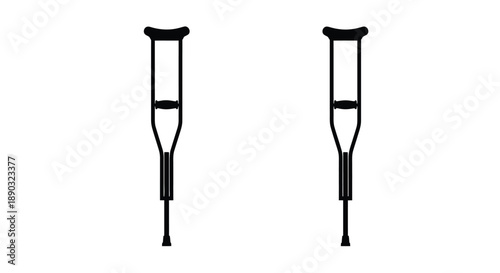 A pair of crutches stand upright against a white background silhouette