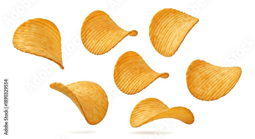 Crunchy, ridged potato chips scattered on a white background, showcasing a popular savory snack.