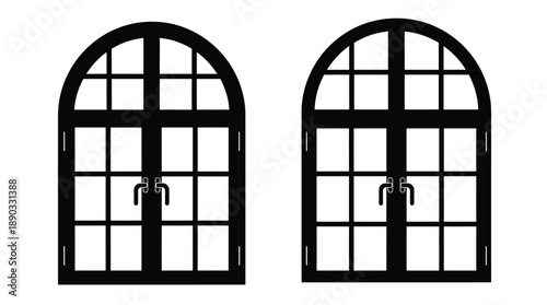 Two arched windows with detailed grilles a striking black silhouette