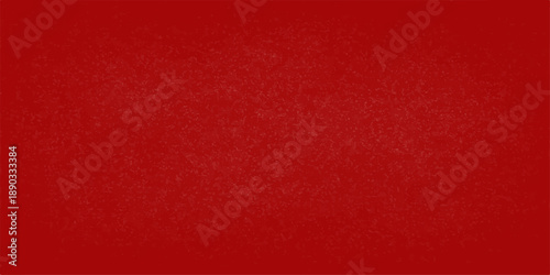 A dark red grunge paper texture with a vintage rough surface design creates a blank old material backdrop and textured canvas wallpaper for a Christmas textile or fabric pattern