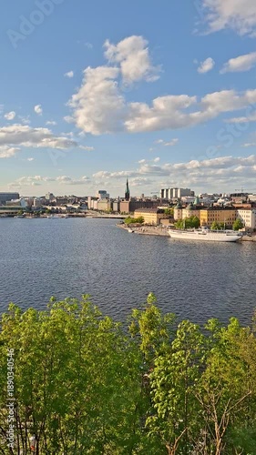 Panoramic skyline of Stockholm with Riddarholmen church and the City Hall over the water Sweden