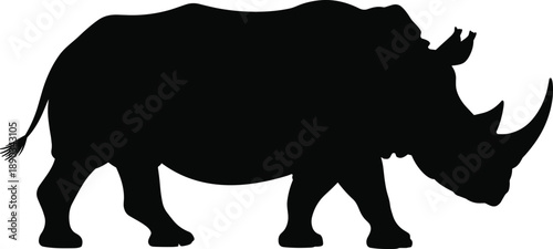 Silhouette of an African rhinoceros walking, powerful endangered wildlife animal isolated on white background for conservation and nature design