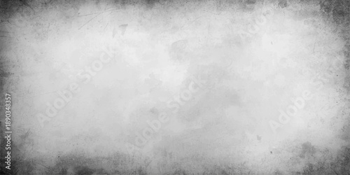 A dark and textured grunge metal background features a rough grey surface with an old vintage pattern, blending dirty cement and antique stone elements into a weathered black wallpaper backdrop