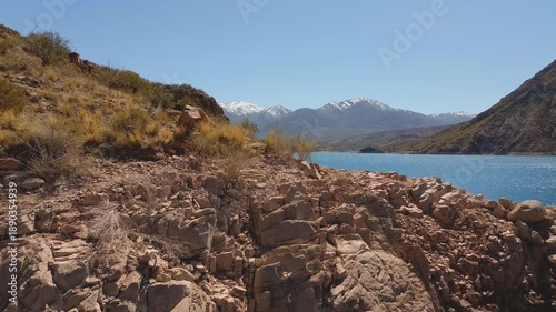 Wallpaper Mural Aerial fly by of the rocky shores of lake Potrerillos in Mendoza, Argentina. Torontodigital.ca