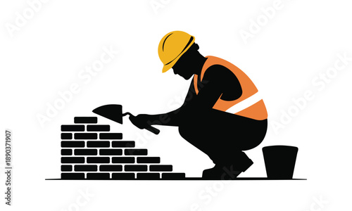 Construction worker laying bricks on a building site silhouette