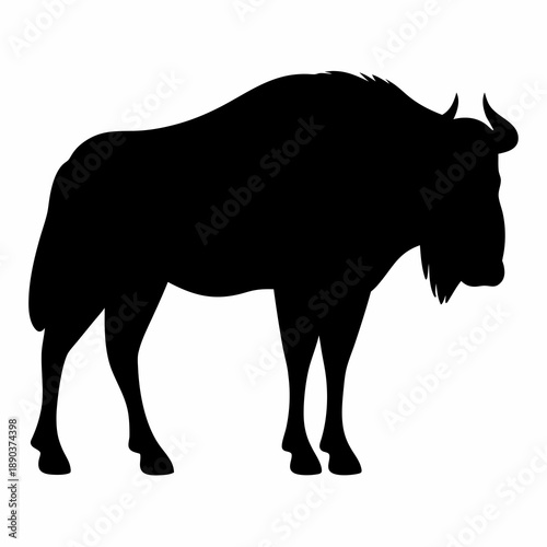 A captivating black silhouette of a Wildebeest gracefully standing on a white background