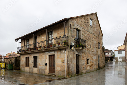 Принти на полотні Traditional stone house building in pendellos village square