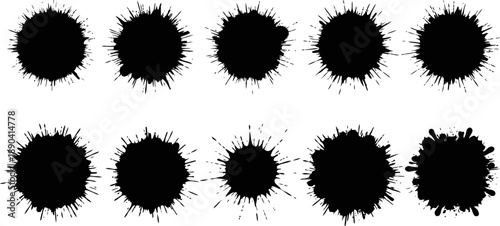 set of black ink splatters and blots with varied shapes and sizes isolated on white background