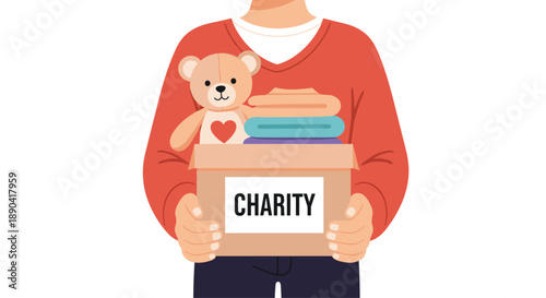 Volunteer holding a charity donation box filled with a teddy bear and folded clothes for social support concept.