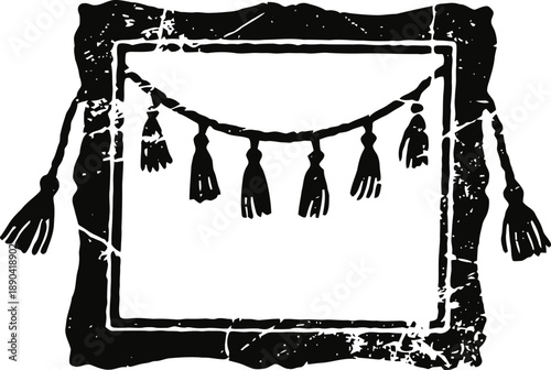 Decorative frame with hanging tassel garland in vintage distressed