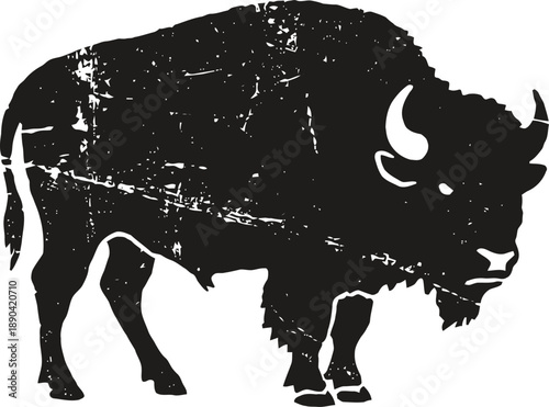 Silhouette of a bison with a textured, weathered effect in black and white