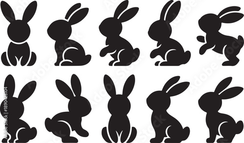 Set of Black Silhouette Rabbit Icons in Different Poses for Easter or Spring Themes rabbit bunny silhouette icon easter spring animal cute playful sitting hopping jumping ears tail white background