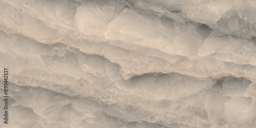 An aerial view of beautiful white sand texture under a bright blue sky with fluffy clouds creates a nature landscape that captures the high beauty of a clear day in the atmosphere