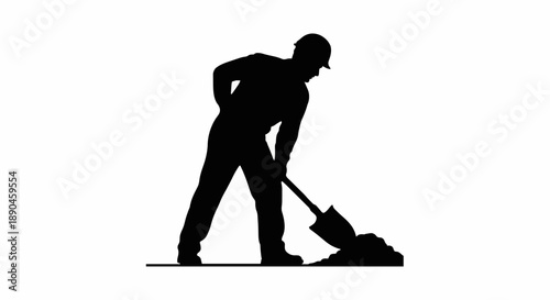 Silhouette of a construction worker digging with a shovel.
