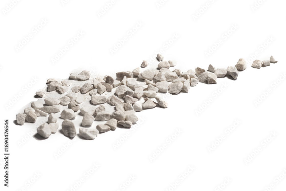 Obraz premium A stack of small brown decorative stones isolated on white background