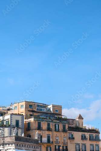 Historic Apartment Buildings Under Clear Blue Sky in Naples, Italy