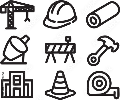 Black and white construction including crane, hard hat, and traffic cone