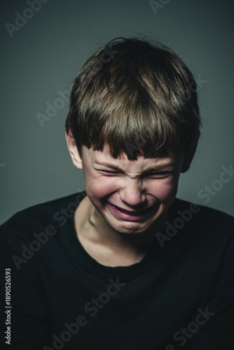 boy crying portrait close-up