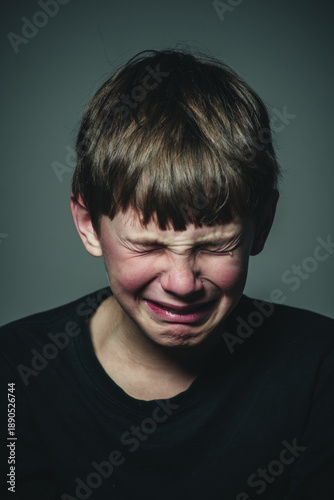 boy crying portrait close-up