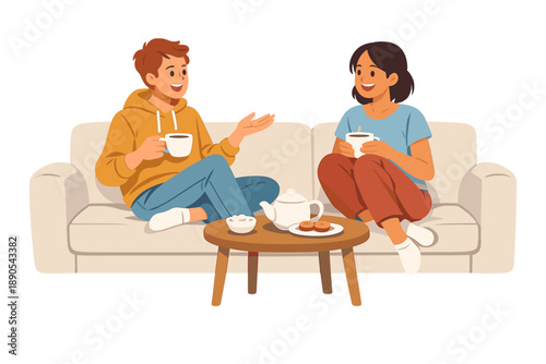 Friends enjoy tea and conversation on a couch at home in the afternoon with snacks on a table
