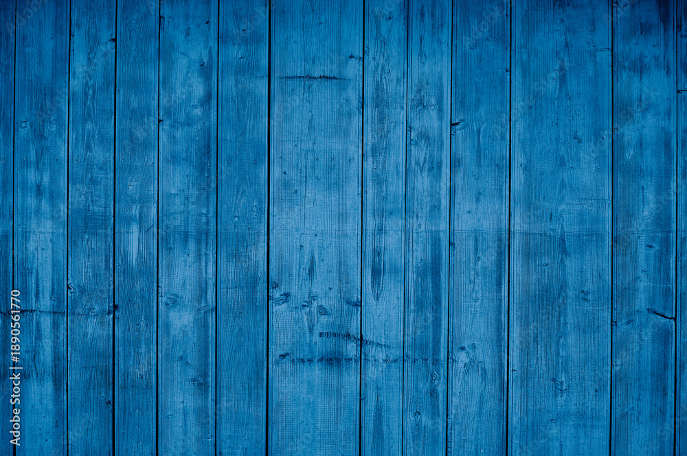 Naklejka premium Blue wood background, abstract wooden texture.